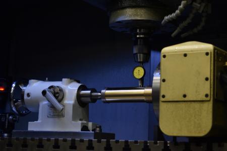 brass cylinder set up on machine close up
